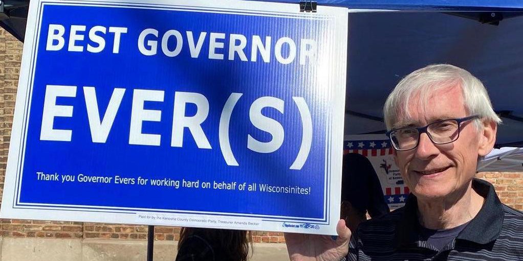 Best Gov Evers with his sign close-up.jpeg
