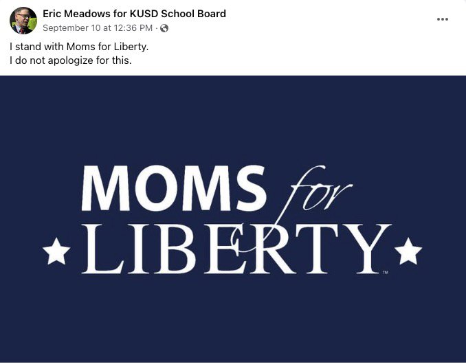 KUSD school board member Eric Meadows stands with Moms for Liberty.jpg